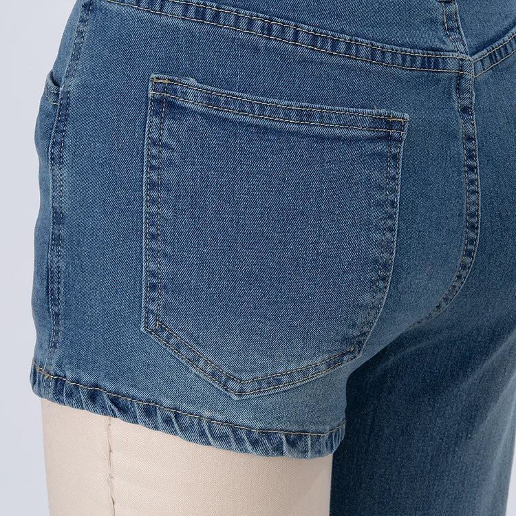 Astra - Muodikkaat asymmetriset denimshortsit yhdellä olkaremmillä